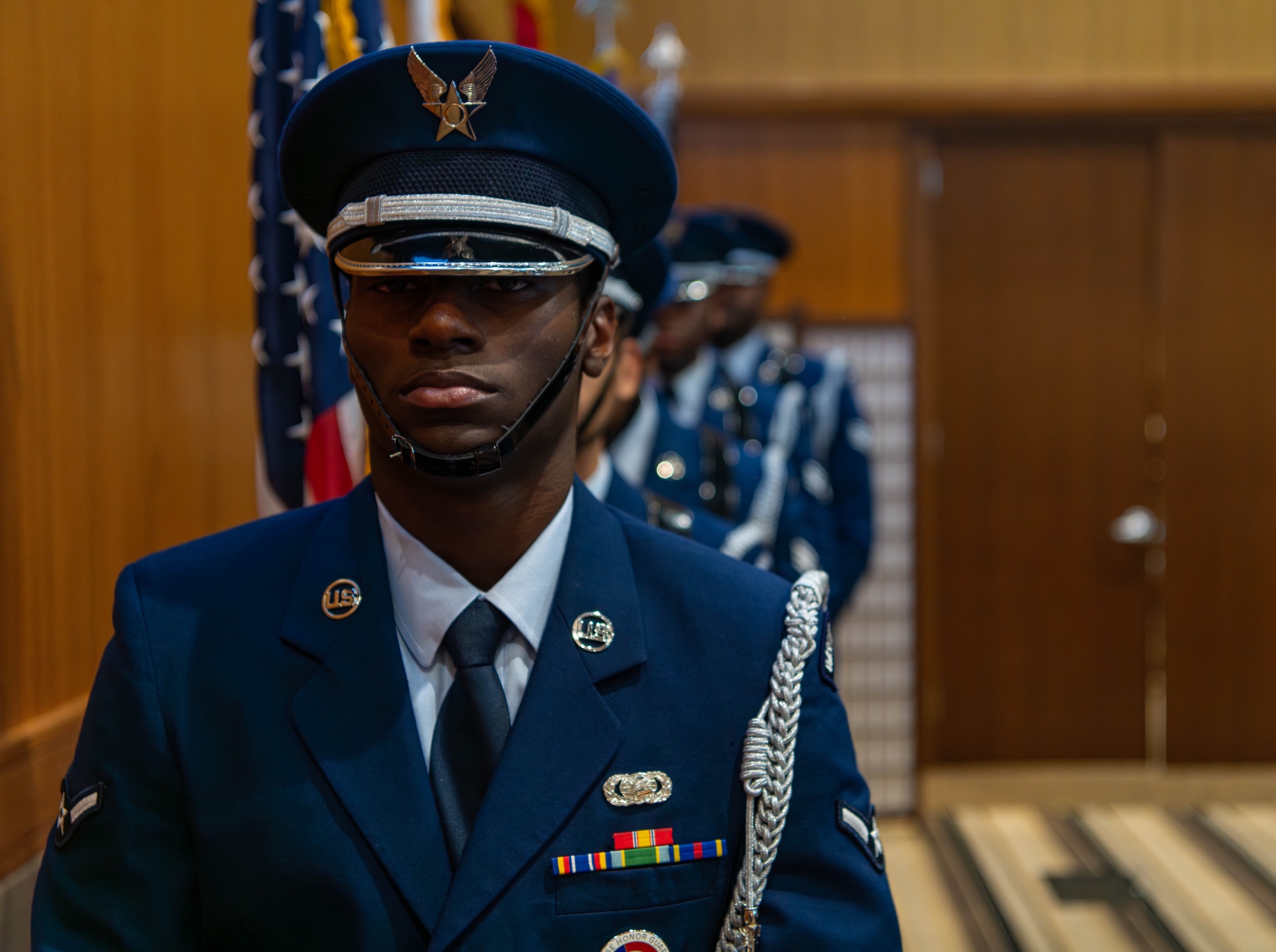 Honor Guard preparing to present the colors during the SNCO induction ceremony