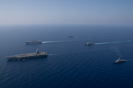 USS Gerald R. Ford (CVN 78) and the Turkish Navy transit the Mediterranean Sea.