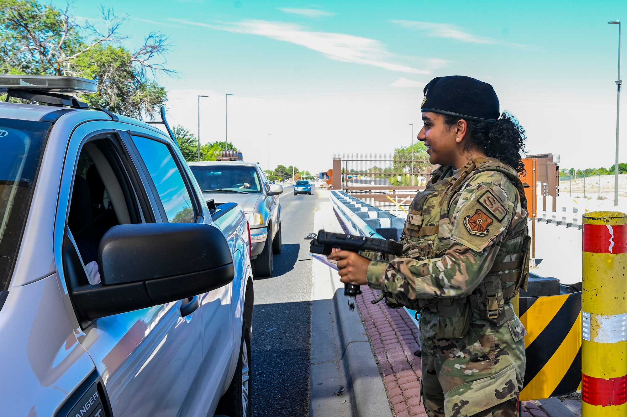 A woman scans an ID.