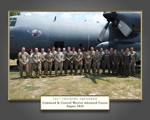  graphic of 22 joint and coalition warfighters standing in front of an airplane with a graphic frame and wording at the bottom center saying "705th Training Squadron Command and Control Warrior Advanced Course, August 2023"