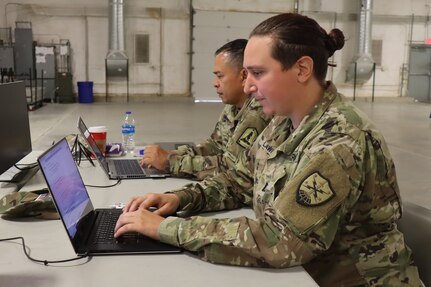 Virginia National Guard Soldiers assigned to the Fort Belvoir-based 91st Cyber Brigade and the Richmond-based Joint Force Headquarters - Virginia Defense Cyber Operations Element take part in the Cyber Fortress 2.0 cyber defense exercise July 13, 2023, at the State Military Reservation in Virginia Beach, Virginia.