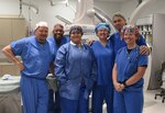 WAMC Interventional Radiology (IR) team pose for a picture. (Left to right) IR technologist, Timmothy Baker, and Anthony Buckmon, Nurses, Crystal Locklear and Amy Harkins missing from picture, Natascha Faircloth IR nurse supervisor, Col. Kirk Russell, interventional radiologist, and Tammy Wasserman IR tech.