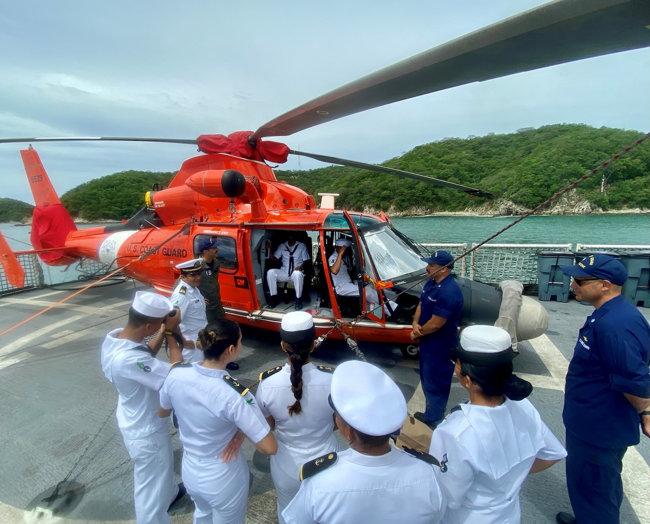 U.S. Coast Guard Cutter Active crew members give a tour to member of the Mexican Navy t(SEMAR) during a port call in Huatulco, Mexico, July 20, 2023. These tours were a part of improving international relationships with the local SEMAR unit. (U.S. Coast Guard photo)