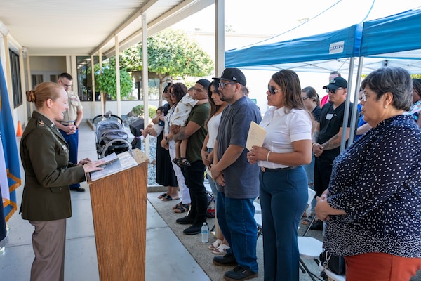 Chaplain, Army Capt. Terri Sykes provides an invocation during a monument unveiling ceremony dedicated to the families of the employees who lost their lives to the COVID pandemic on Aug. 18, 2023, at the DLA Distribution San Joaquin, California, installation. DLA photo by Julian Temblador.