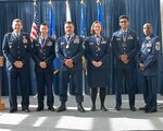 U.S. Air Force Lt. Gen. Michael Loh, left, director, Air National Guard and Chief Master Sgt. Maurice Williams, right, command chief, ANG, pose with the ANG’s 2023 Outstanding Airmen of the Year at the Air National Guard Readiness Center, Joint Base Andrews, Maryland, Aug. 24, 2023. All four Outstanding Airmen of the Year participated in Focus on the Force Week.