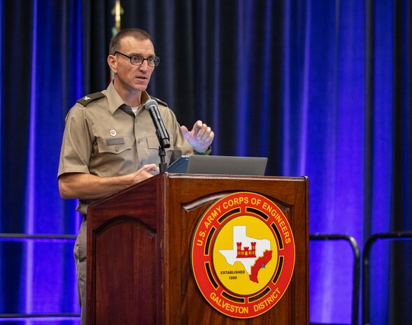a person is standing at a podium talking