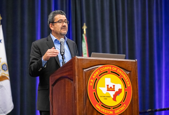 a person is standing at a podium talking
