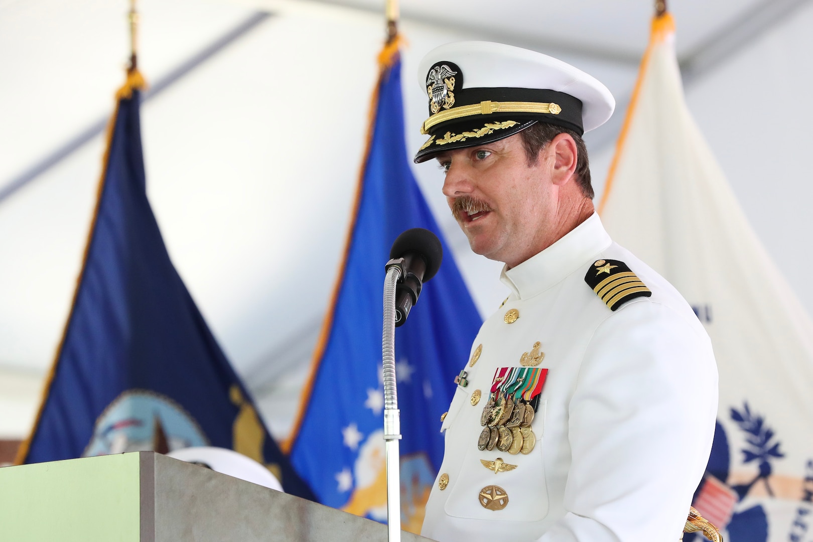 Incoming Naval Surface Warfare Center Indian Head Division Commanding Officer Capt. Stephen Duba addresses the audience at the change of command ceremony at Naval Support Facility Indian Head, Md., Aug. 25. Duba will now oversee the DoD’s largest full-spectrum energetics facility and the Navy’s only public arsenal supporting the DoD, the nation’s partners and allies.