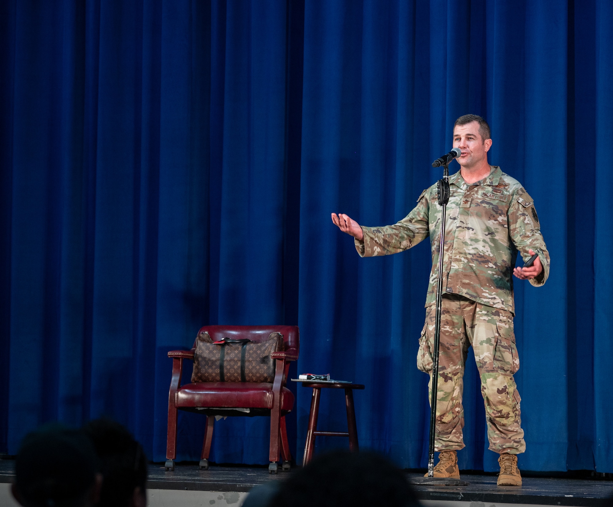 U.S. Air Force Col. Paul Sheets, 23rd Wing commander, welcomes guests and performers before the Smash Up Comedy Night at Moody Air Force Base, Georgia, Aug. 17, 2023. The Smash Up Comedy tour was an on-base family event which dazzled the audience with comedy, magic, and music. (U.S. Air Force photo by Airman 1st Class Leonid Soubbotine)