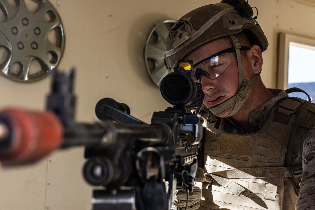 U.S. Marine Corps Lance Cpl. Edgar Leeprodriguez, a rifleman with Kilo Company, 3rd Battalion, 7th Marine Regiment, provides security during Adversary Force Exercise (AFX) 5-23 at Marine Corps Air-Ground Combat Center, Twentynine Palms, California, Aug. 7, 2023. AFX 5-23 tested the skills of Marines in seizing and maintaining a combat presence in urban environments by practicing offensive and defensive tactics, conducing logistics in a contested environment, and utilizing mechanized infantry. (U.S. Marine Corps photo by Cpl. Jonathan Willcox)