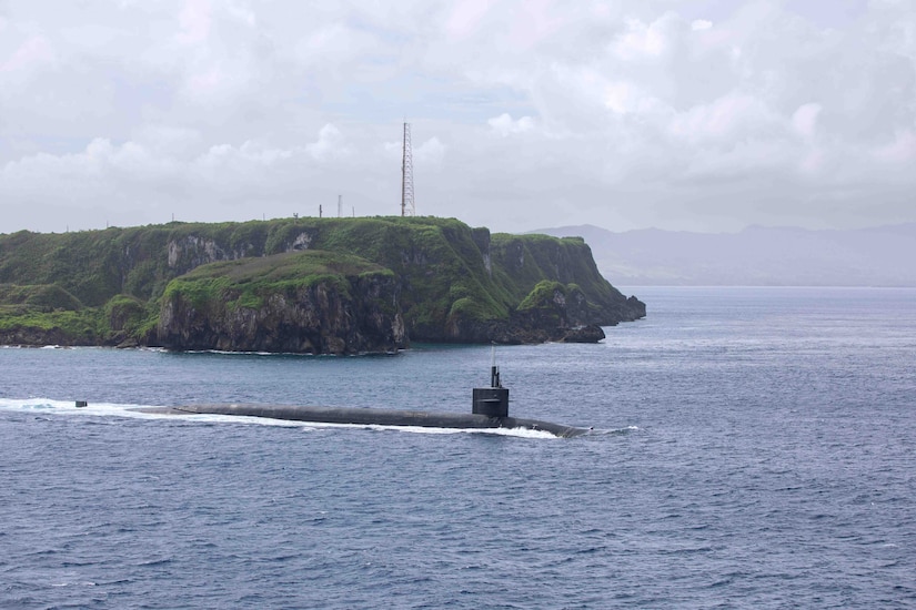 A submarine transits open water.