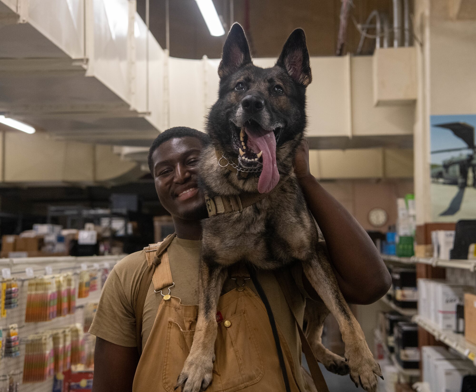 Airforce K9 handler poses with Partner