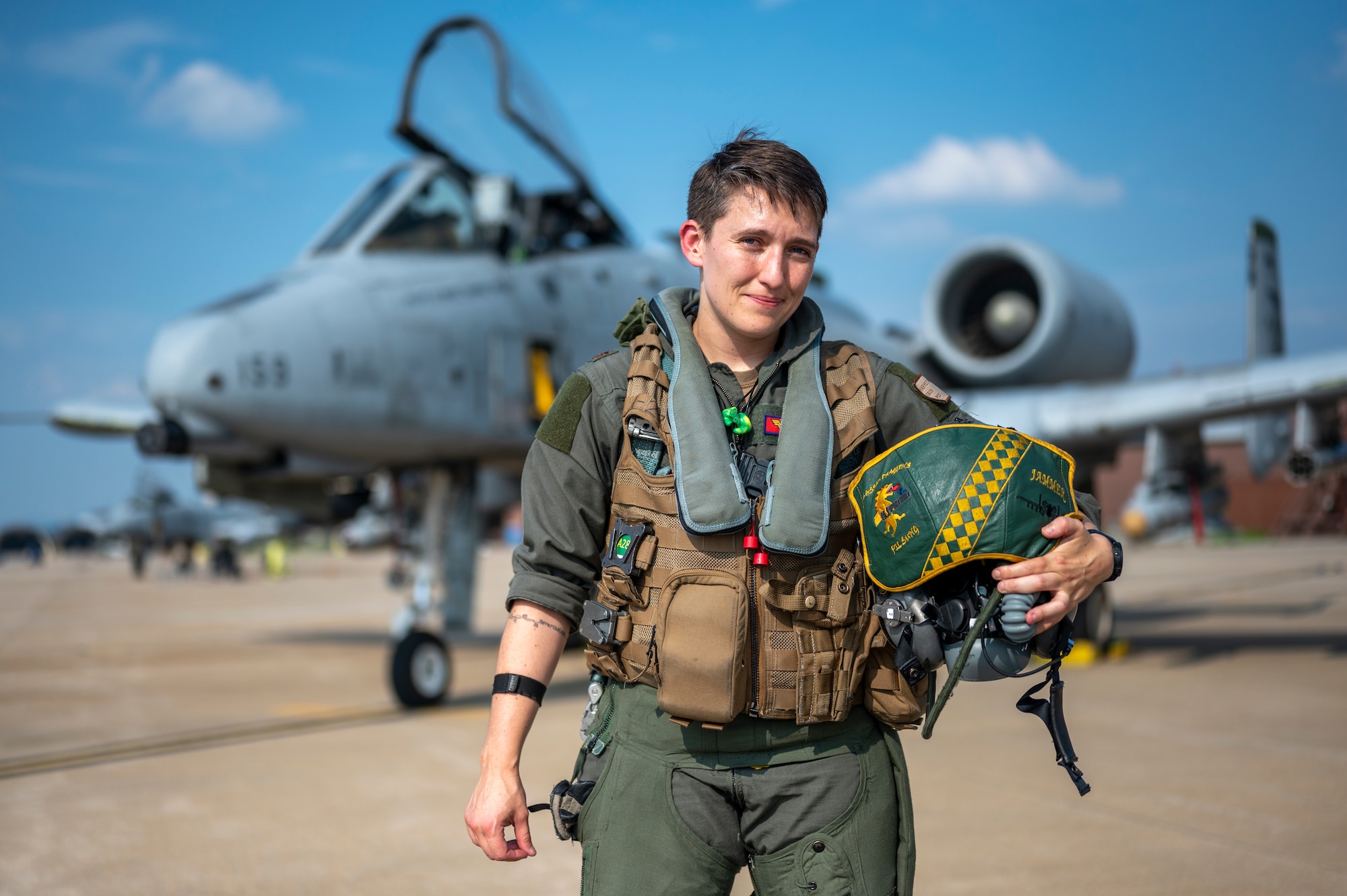 U.S. Air Force Maj. Samantha Harvey, 51st Operational Support Squadron chief of weapons and tactics, poses for a photo as a part of Women’s Equality Day at Osan Air Base, Republic of Korea, Aug. 17, 2023. Harvey ensures pilots assigned to the 51st Fighter Wing receive the plans, materials and tactical training they need to carry out missions in line with the commander’s intent. In 2013, Secretary of Defense Leon Panetta announced that the U.S. Armed Forces would lift a ban on women serving in combat. In 2015, the historic change opened up thousands of jobs for women in the military and ensured that as long as female service members met requirements and completed training, they could now serve in almost any role in the military. The opening of these jobs to women allows the installation’s fighter squadrons to gain valuable and beneficial perspective on the battlefield. (U.S. Air Force photo by Senior Airman Aaron Edwards)