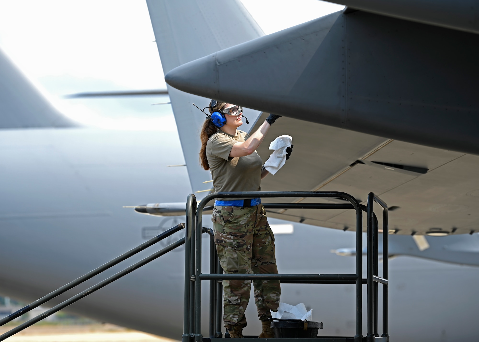 U.S. Air Force Senior Airman Britteny Cox, aircraft fuel systems technician with the 62d Maintenance Squadron, checks for fuel leaks at Joint Base Lewis-McChord, Washington, Aug. 23, 2023. The 62d MXS provides precision measurement equipment services to Air Force major commands, Department of Defense components and interdepartmental agencies. (U.S. Air Force photo by Senior Airman Callie Norton)
