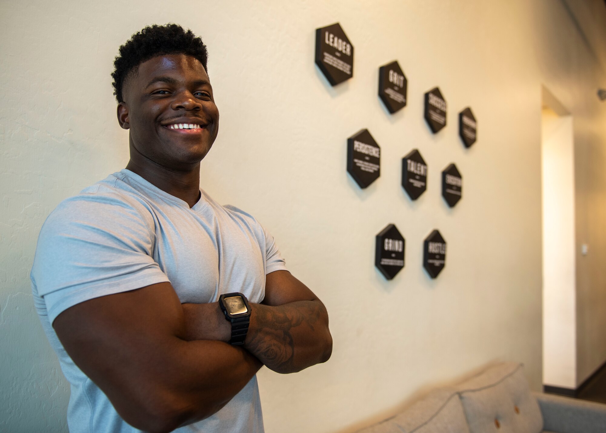 U.S. Air Force Staff Sgt. Donte Alexander, 372nd Training Squadron avionics instructor, poses for a photo at On Point Solar Power, Phoenix, Arizona, Aug. 23, 2023.