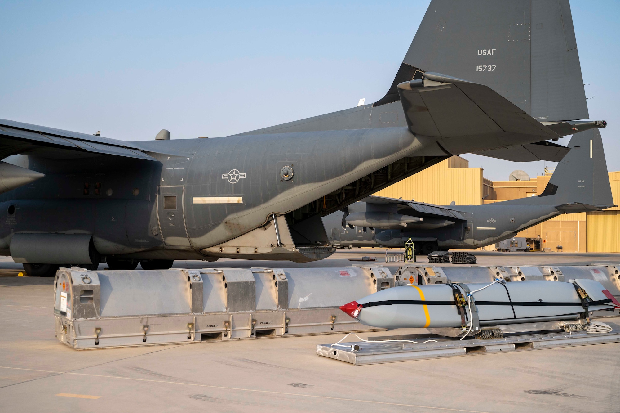 Members of the U.S. Air Force 6th Expeditionary Maintenance Squadron and the 6th Special Operations Tasking Unit demonstrated the MC-130J’s Commando II capability of loading and unloading Joint Air-to-Surface Standoff Missiles (JASSM) at Al Udeid Air Base, Qatar, Aug. 6, 2023. The Rapid Dragon palletized munitions system is capable of deploying long-range cruise missiles using standard airdrop procedures from cargo aircraft like the MC-130J operated by Air Force Special Operations Command. Rapid Dragon is a precision munitions capability for medium-sized or larger cargo aircraft that allows U.S. forces a flexible rapid response option. (U.S. Air Force photo by Staff Sgt. Frank Rohrig)