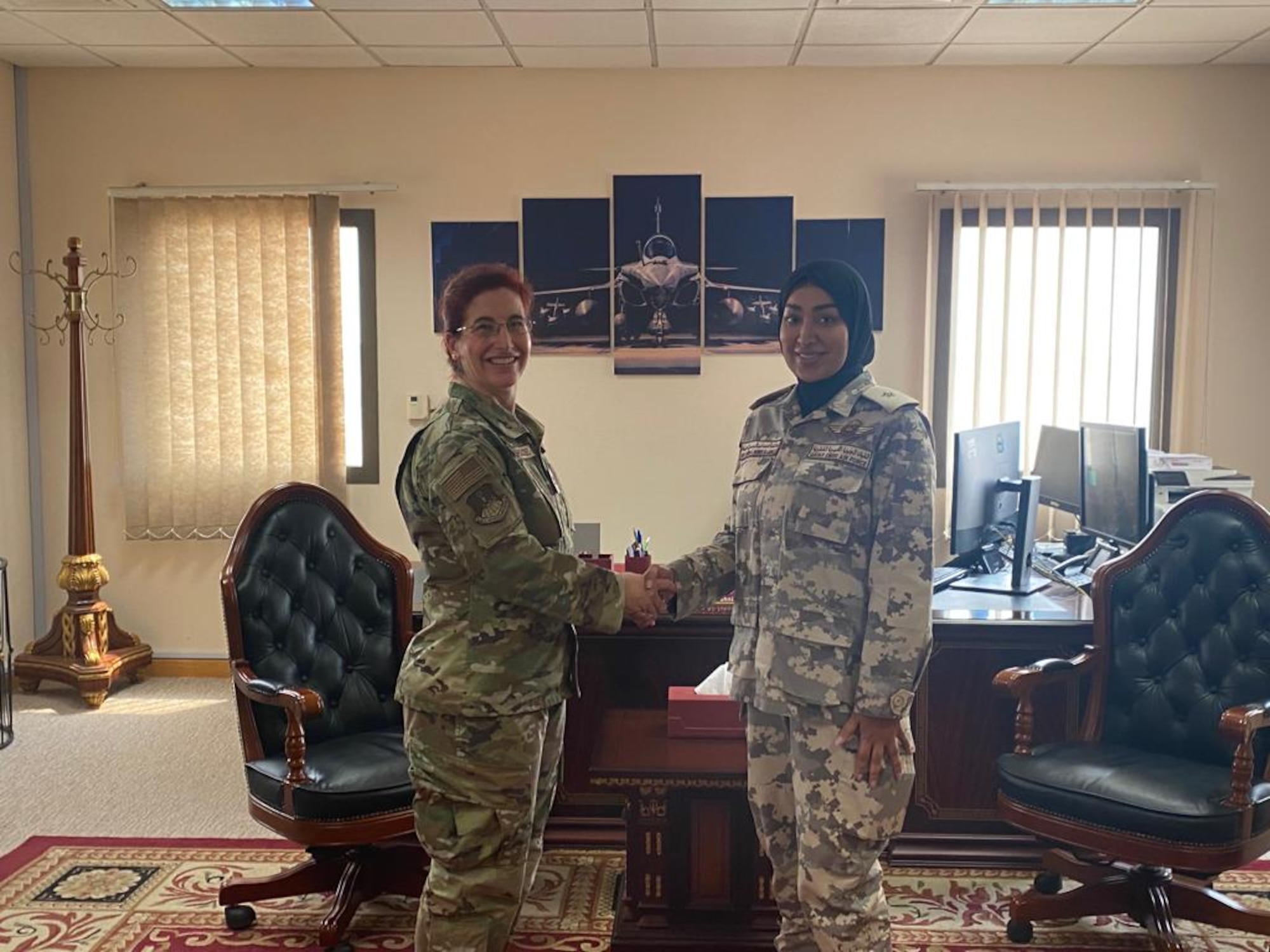U.S. Air Force Col. Julie Sposito-Salceies, left, 609th Air Operations Center commander, meets the first group of Qatari women air space controllers Aug. 17, 2023 in Qatar. (Courtesy photo)