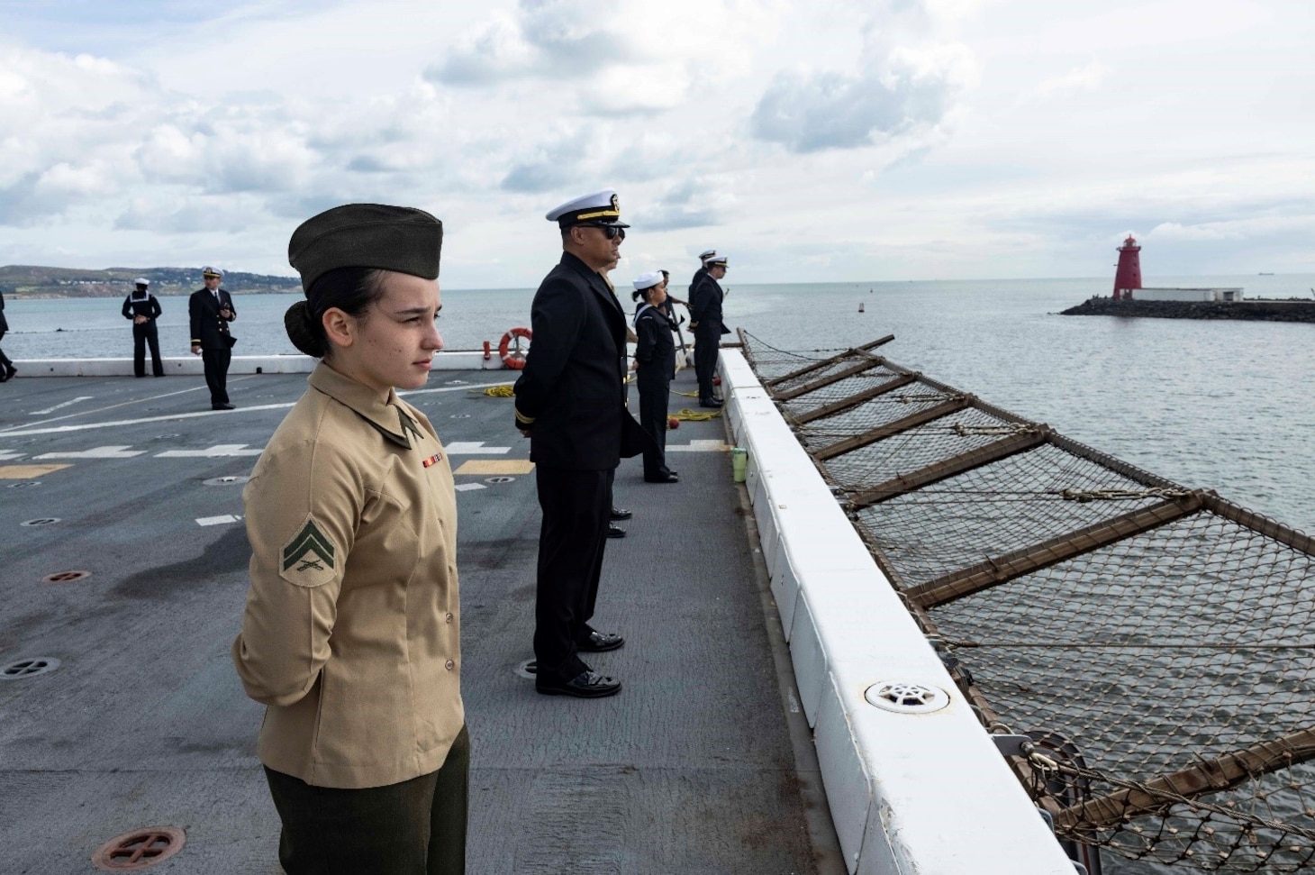 Sailors and Marines man the rails as USS Mesa Verde (LPD 19) makes a scheduled port visit to Dublin, Ireland, Aug. 25, 2023. Mesa Verde, assigned to the Bataan Amphibious Ready Group and embarked 26th MEU(SOC), under the command and control of Task Force 61/2, is on a scheduled deployment in the U.S. Naval Forces Europe area of operations, employed by U.S. Sixth Fleet to defend U.S., allied and partner interests. (U.S. Marine Corps photo by Staff Sgt. Jesus Sepulveda Torres)