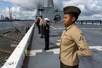 Sailors and Marines man the rails as USS Mesa Verde (LPD 19) makes a scheduled port visit to Dublin, Ireland, Aug. 25, 2023. Mesa Verde, assigned to the Bataan Amphibious Ready Group and embarked 26th MEU(SOC), under the command and control of Task Force 61/2, is on a scheduled deployment in the U.S. Naval Forces Europe area of operations, employed by U.S. Sixth Fleet to defend U.S., allied and partner interests. (U.S. Marine Corps photo by Staff Sgt. Jesus Sepulveda Torres)