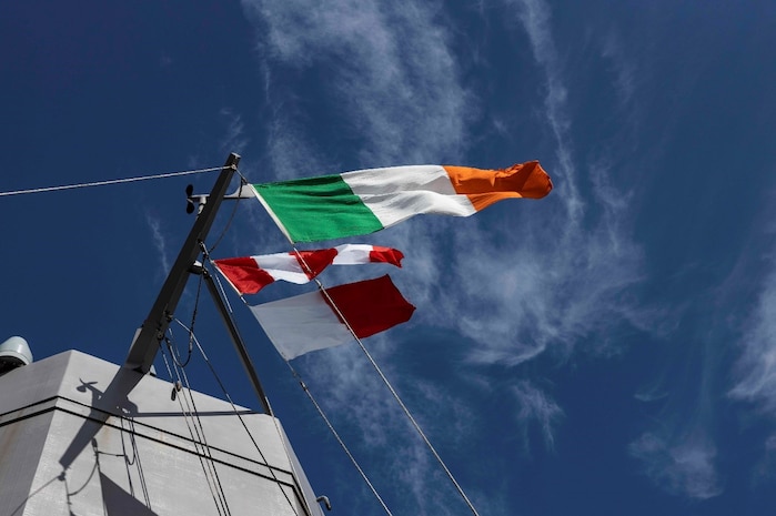 USS Mesa Verde (LPD 19) flies the national flag of Ireland during a scheduled port visit to Dublin, Ireland, Aug. 25, 2023. Mesa Verde, assigned to the Bataan Amphibious Ready Group and embarked 26th MEU(SOC), under the command and control of Task Force 61/2, is on a scheduled deployment in the U.S. Naval Forces Europe area of operations, employed by U.S. Sixth Fleet to defend U.S., allied and partner interests. (U.S. Marine Corps photo by Staff Sgt. Jesus Sepulveda Torres)