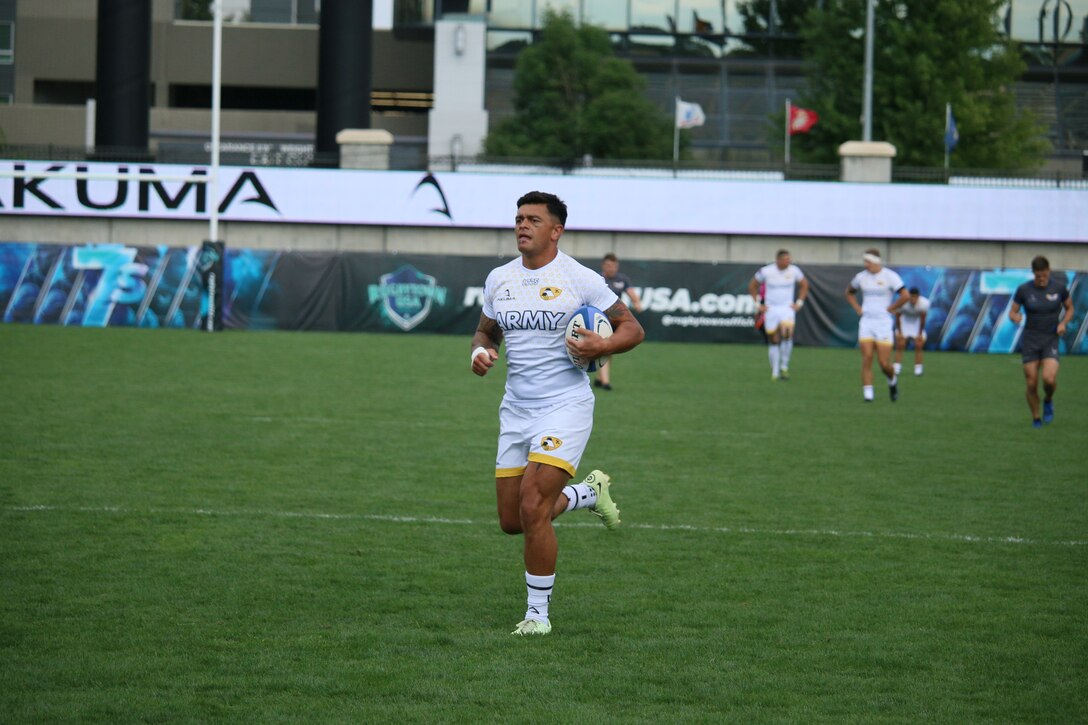 Army 2nd lt. Faleniko Spino of Auburn University ROTC heads into the try zone as Army wins the 2023 Armed Forces Sports Men's Rugby Championship held in conjunction with the Rugbytown 7's Rugby Tournament in Glendale, Colo.  Championship features teams from the Army, Marine Corps, Navy, Air Force (with Space Force players), and Coast Guard.  (Dept. of Defense photo by Mr. Steven Dinote, released)