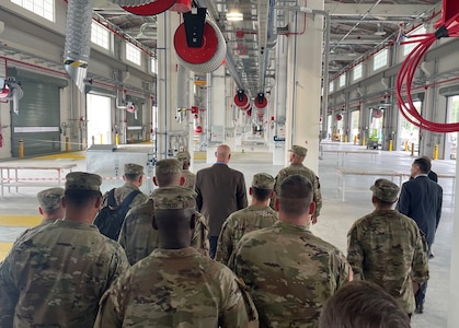 Vice Chief of Staff of the Army Gen. Randy George and Sgt. Maj. of the Army Michael Weimer tour the 405th Army Field Support Brigade’s Long Term Equipment Storage and Maintenance-Complex in Powidz, Poland, Aug. 26. (U.S. Army courtesy photo)