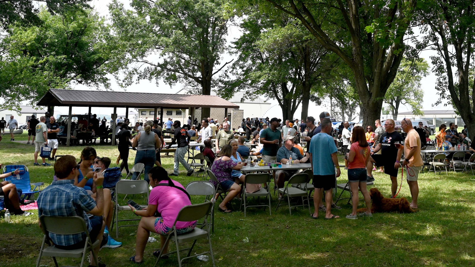 People socialize during picnic
