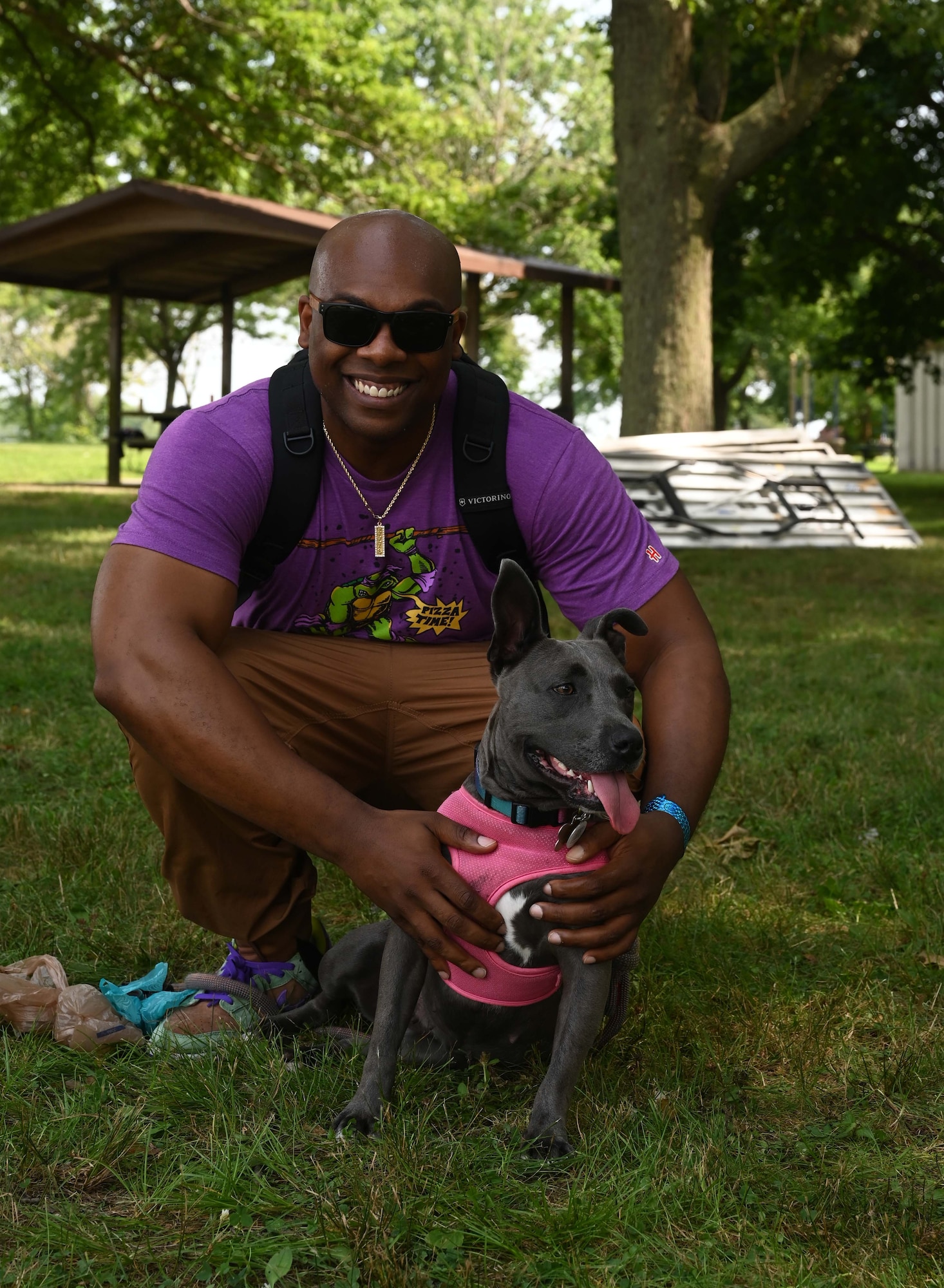 Robinson poses with dog