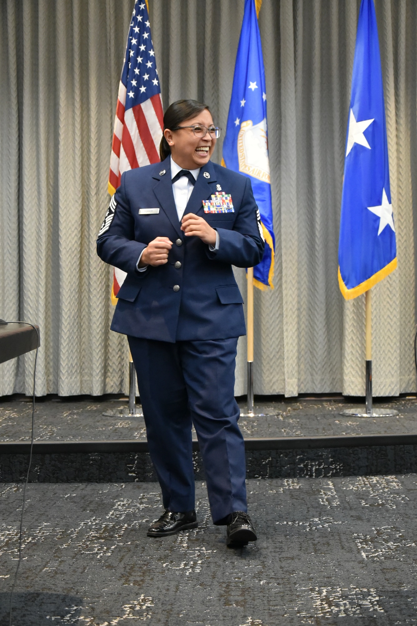 Command Chief Master Sgt. Maribeth O. Ferrer speaks