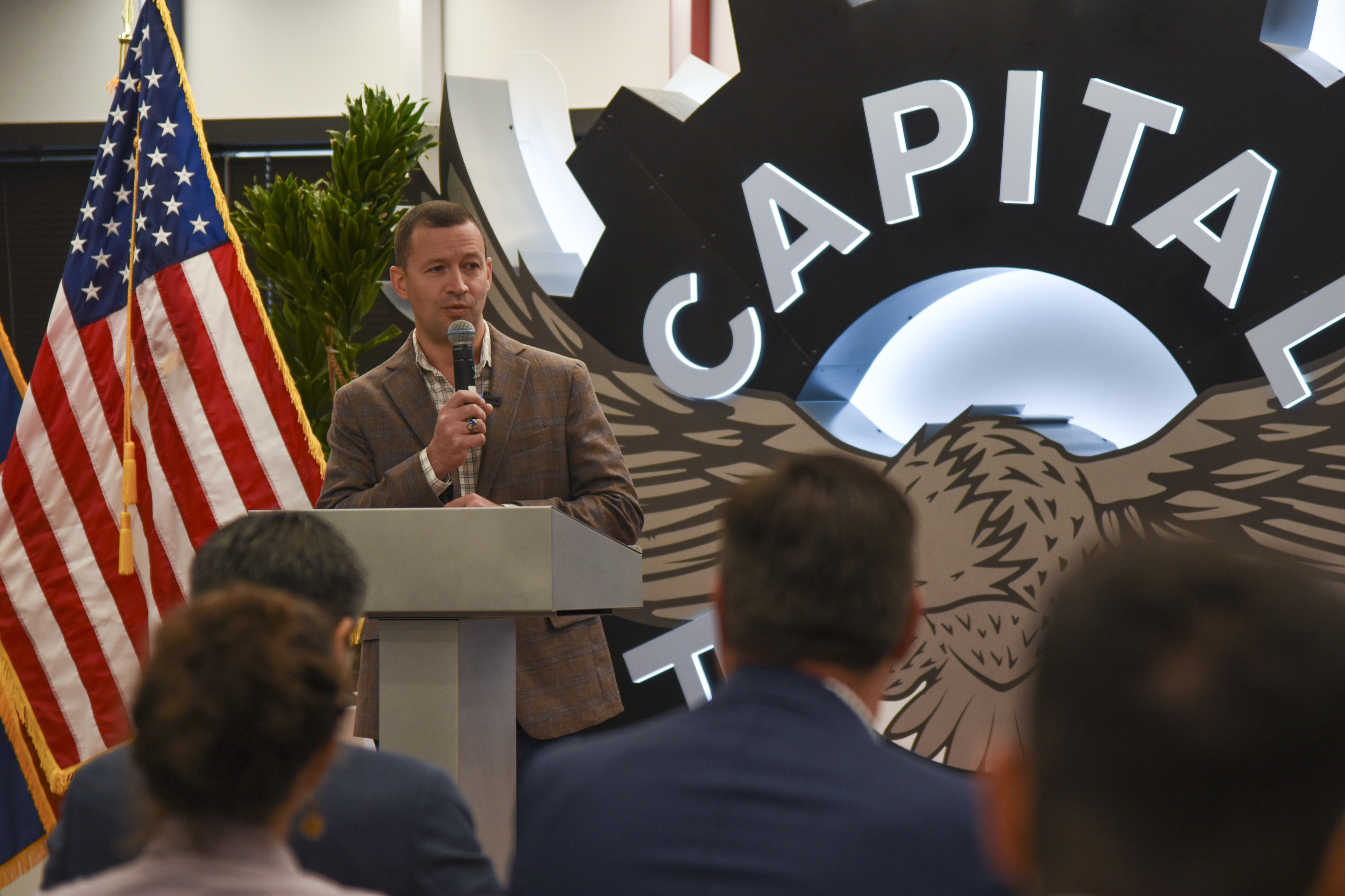 Col. Elliott Leigh, AFWERX director and chief commercialization officer for the Department of the Air Force, kicks off the Fed Supernova Spark Collider event with a briefing to attendees at Capital Factory in Austin, Texas, Aug. 22, 2023.