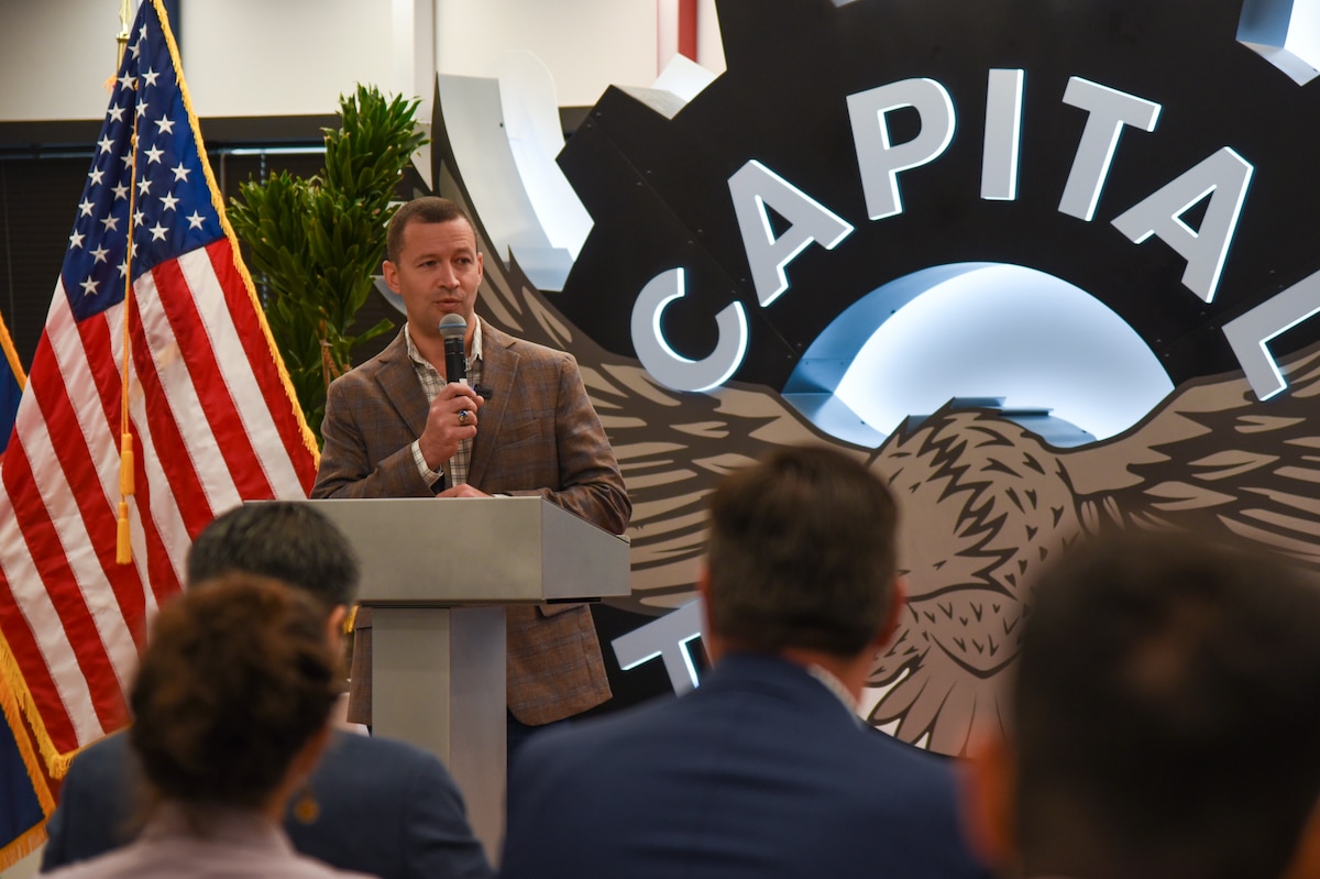Col. Elliott Leigh, AFWERX director and chief commercialization officer for the Department of the Air Force, kicks off the Fed Supernova Spark Collider event with a briefing to attendees at Capital Factory in Austin, Texas, Aug. 22, 2023.