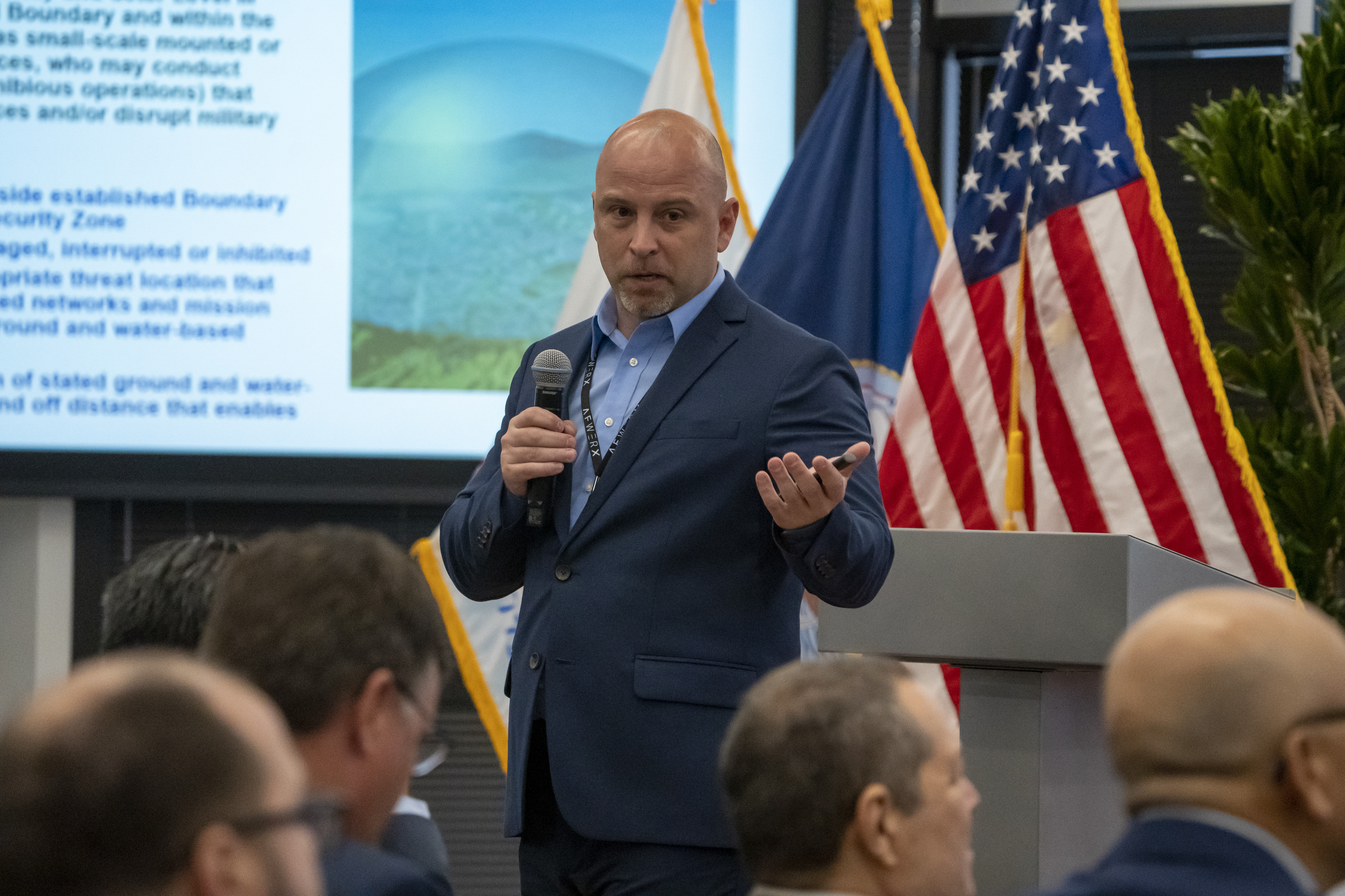 Alexander Erb, Air Force Security Forces Center innovations program manager, briefs more than 20 industry partners at the Fed Supernova Spark Collider event at Capital Factory in Austin, Texas, Aug. 22, 2023.