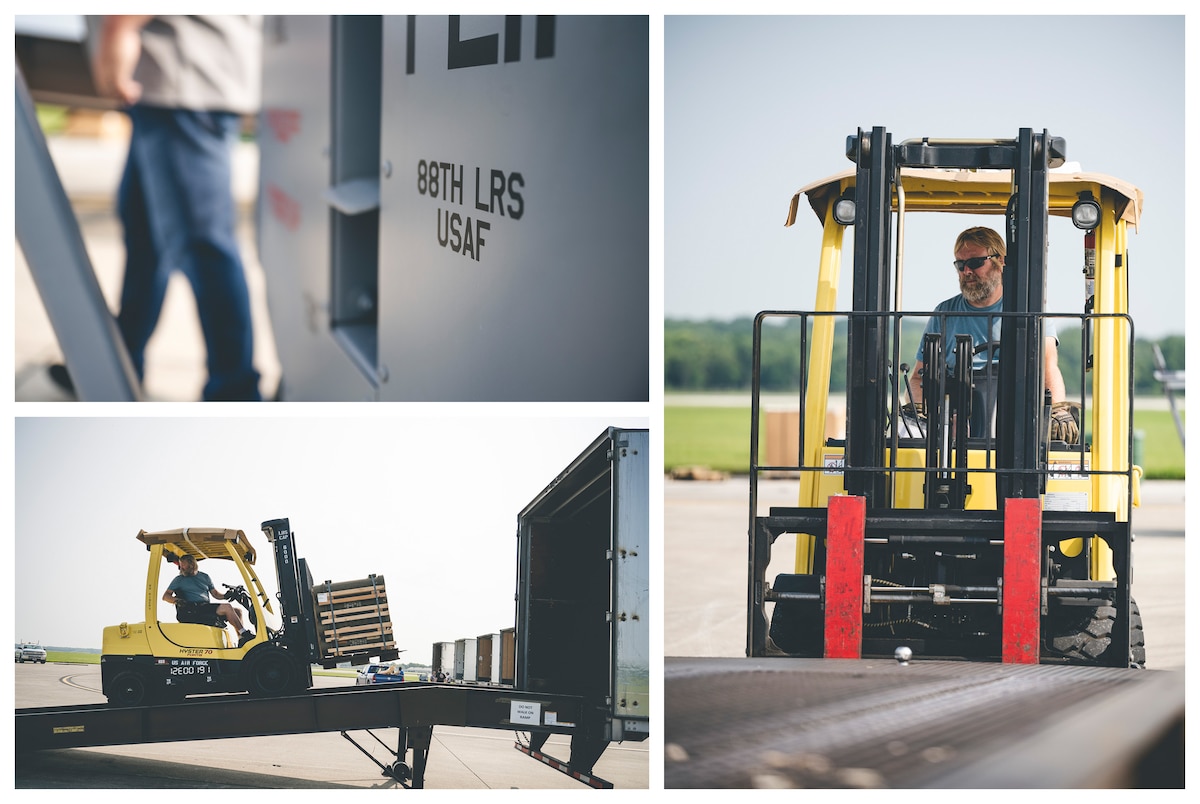 A LRS contractor operates a forklift to move cargo.