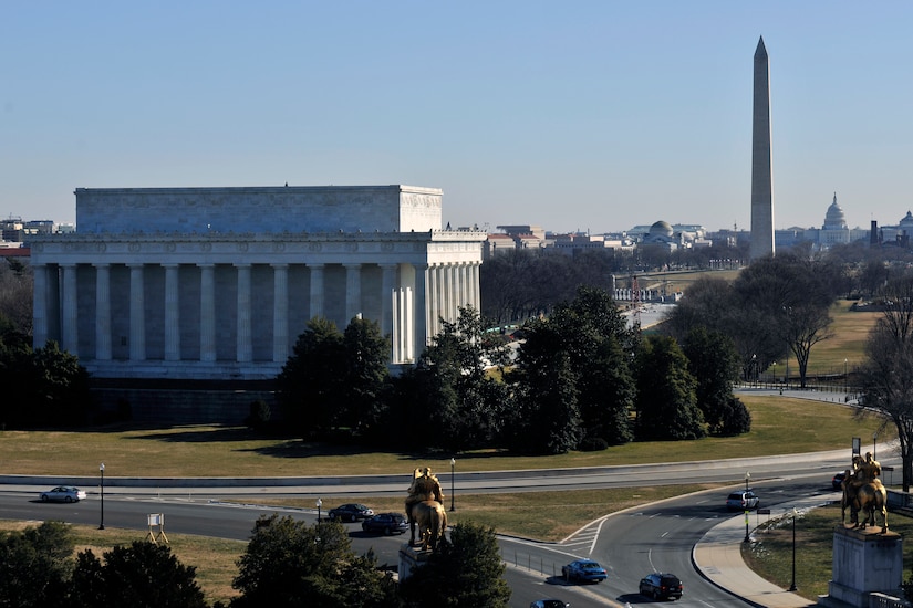 A photo shows the Lincoln Memorial against a background of buildings and monuments in Washington, D.C.