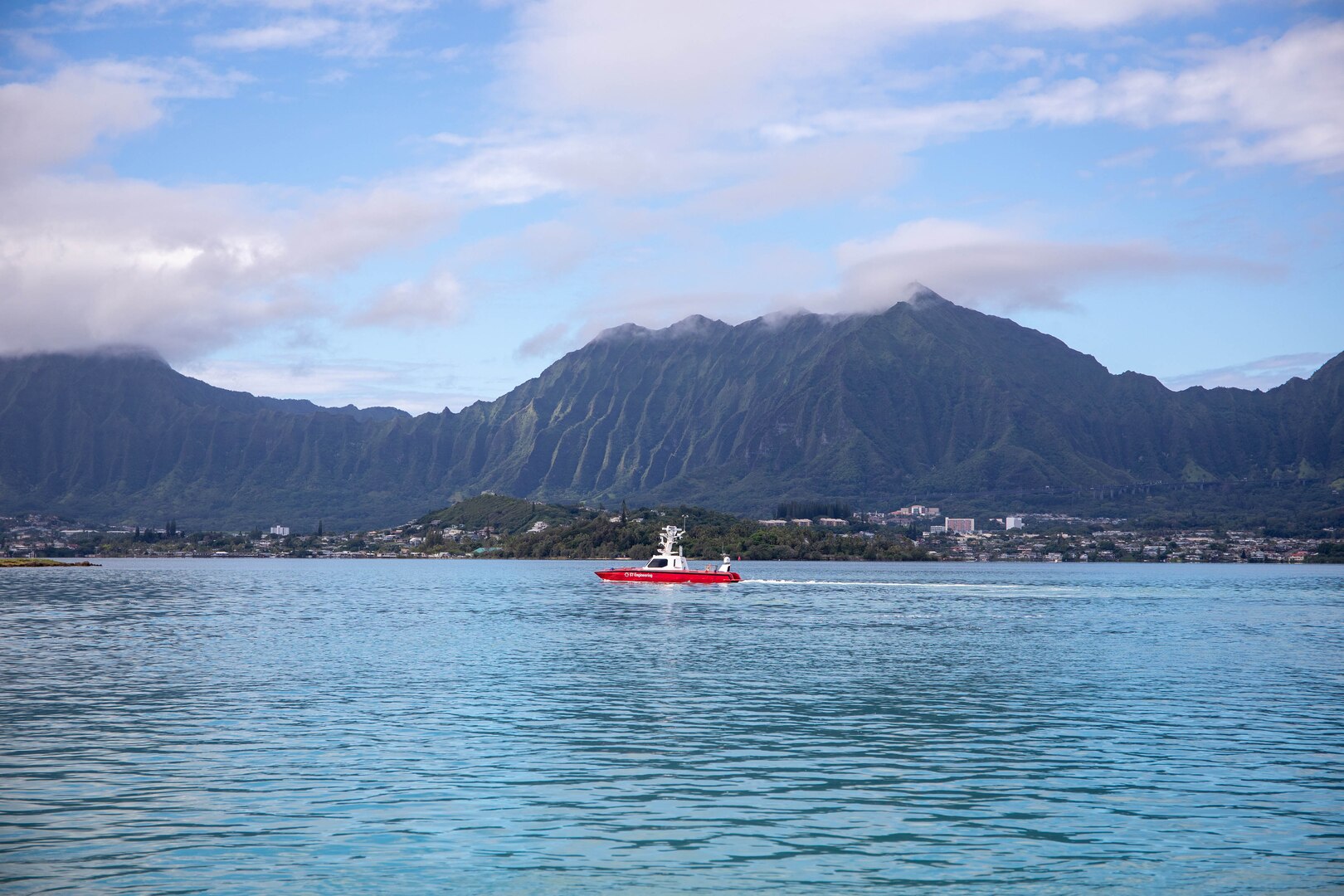 A vessel transits in open water.
