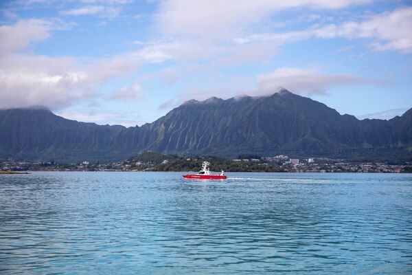 A vessel transits in open water.