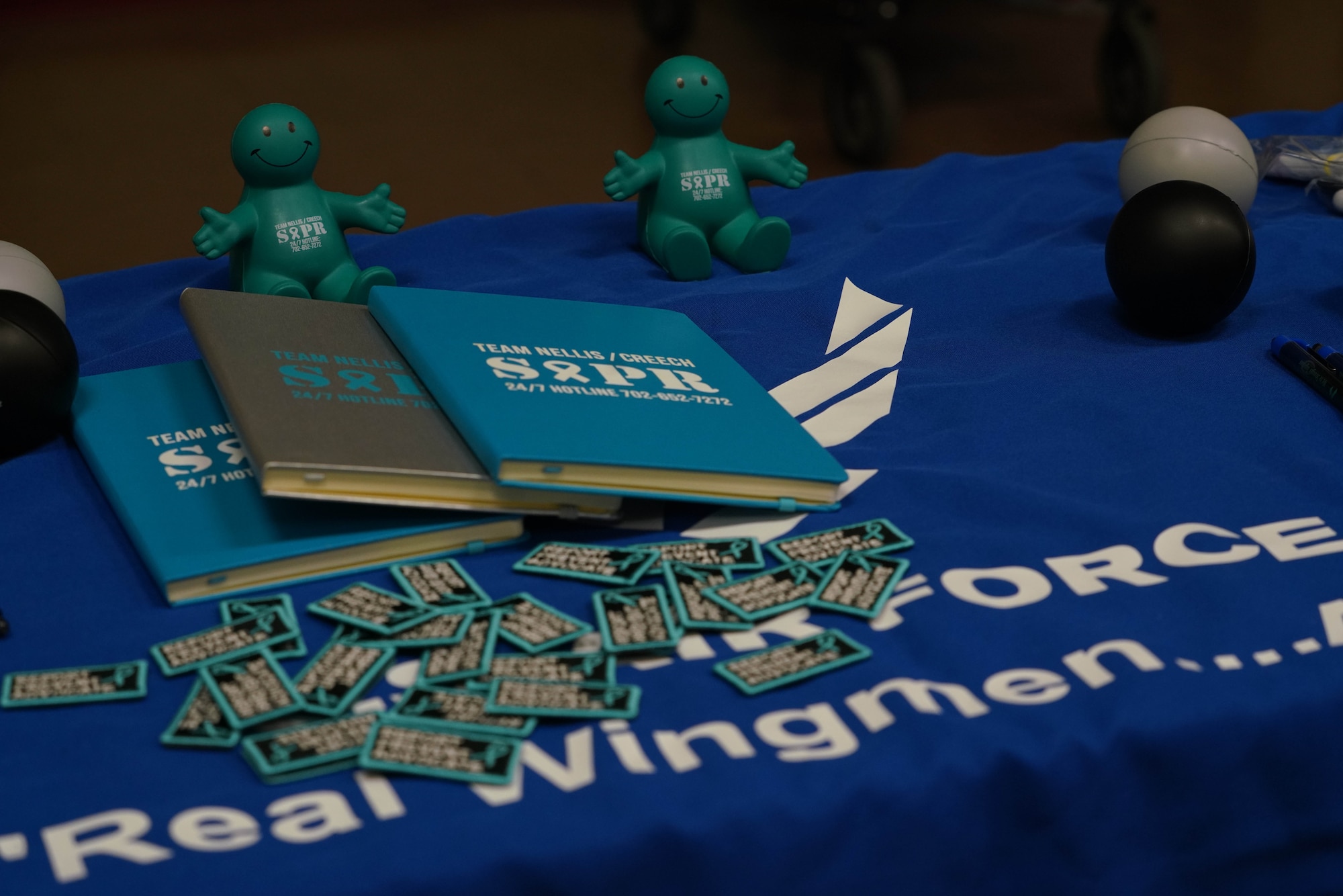 Office items displayed on a table used to promote awareness of the SAPR office.