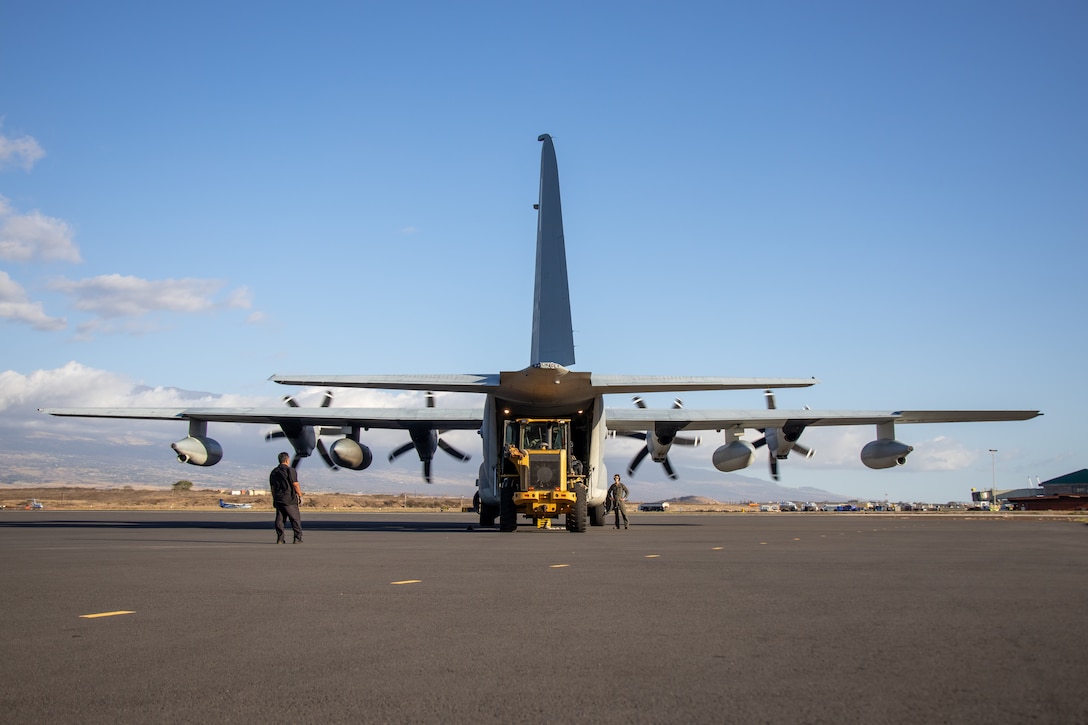 A KC-130J Hercules assigned to Marine Aerial Refueler Transport Squadron 153 (VMGR-153), Marine Aircraft Group 24, 1st Marine Aircraft Wing, is unloaded at Kahului Airport, Maui, Hawaii, Aug. 22, 2023. At the request of Joint Task Force 50, and in accordance with U.S. federal law, Hawaii based U.S. Marines with VMGR-153 provided inter-island transportation of personnel and equipment from Oahu to Maui. (U.S. Marine Corps photo by Lance Cpl. Logan Beeney)