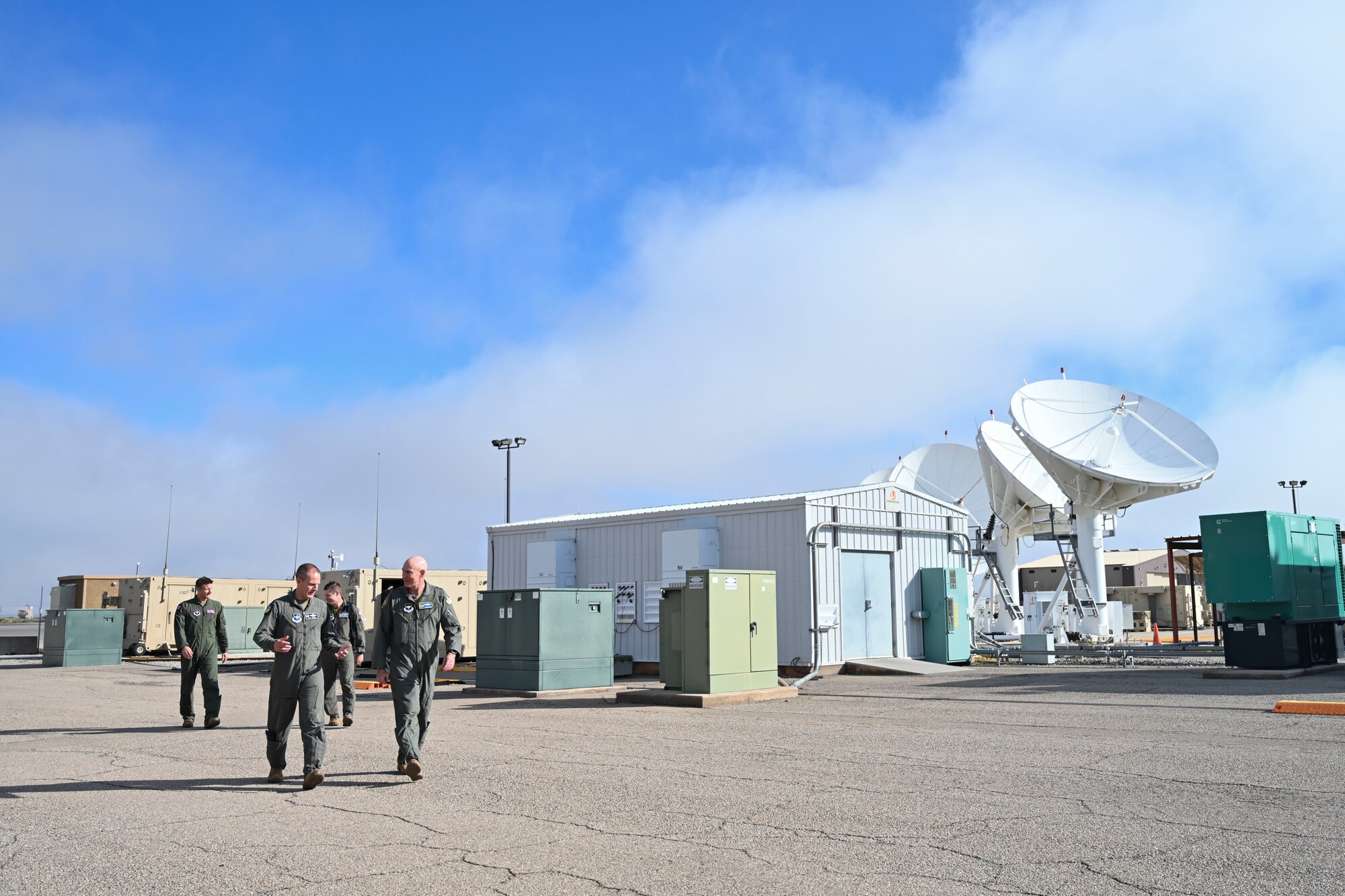 U.S. Air Force Maj. Gen. Clark Quinn, 19th Air Force commander, and U.S. Air Force Col. Justin Spears, 49th Wing commander, tour ground control stations at Holloman Air Force Base, New Mexico, Aug. 24, 2023.