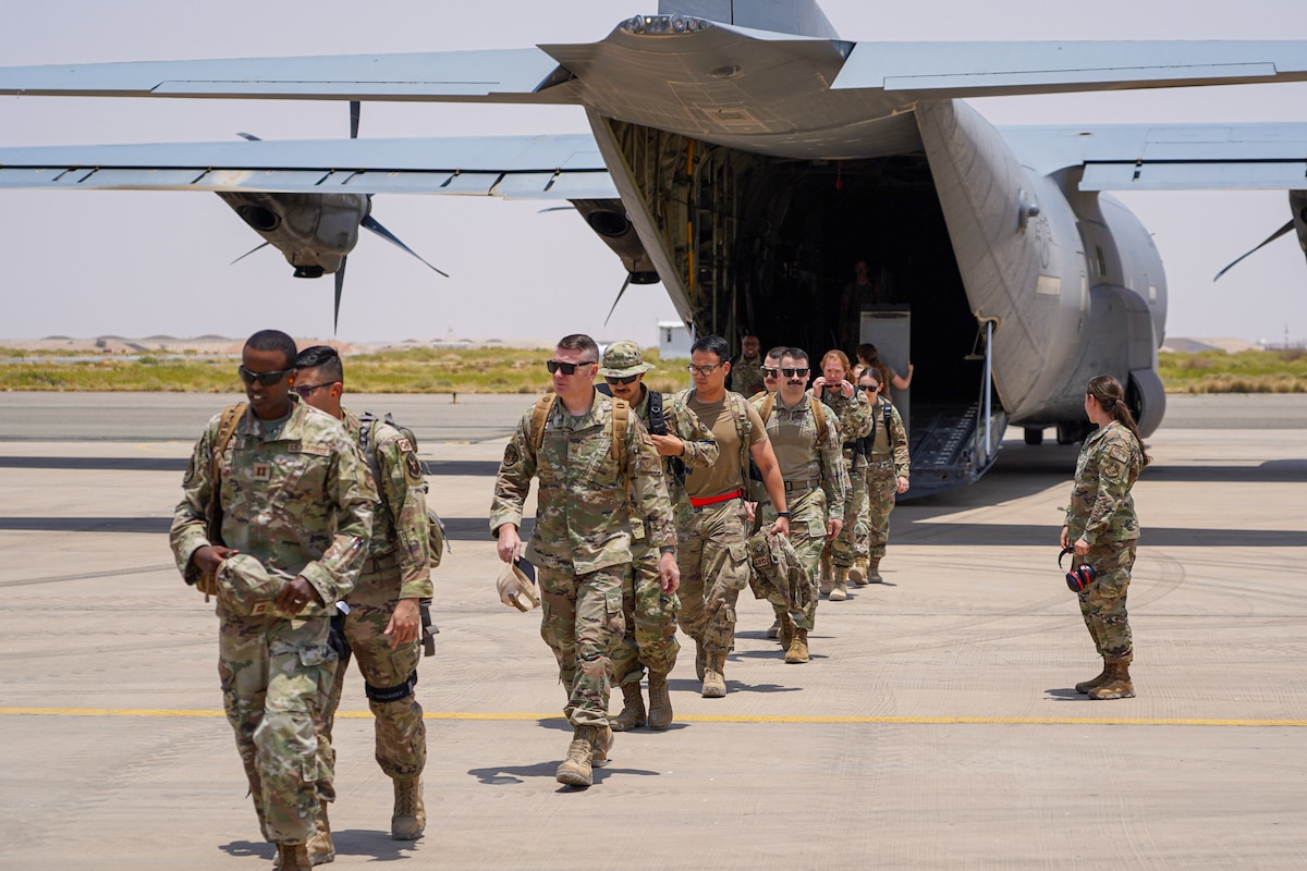 US. Airmen from the 378th Air Expeditionary Wing arrive for Operation Agile Spartan 23.2 at an undisclosed location, Aug. 20, 2023. Agile Spartan 23.2 is a multinational operation aimed at demonstrating interoperability, improving response capabilities, and furthering security cooperation initiatives throughout the U.S. Central Command area of responsibility. The exercise provides a chance for U.S. and coalition forces to validate Agile Combat Employment (ACE) capabilities and expand the number of ACE locations from which coalition air forces can generate combat missions. (U.S. Air Force photo by Tech. Sgt. Alexander Frank)