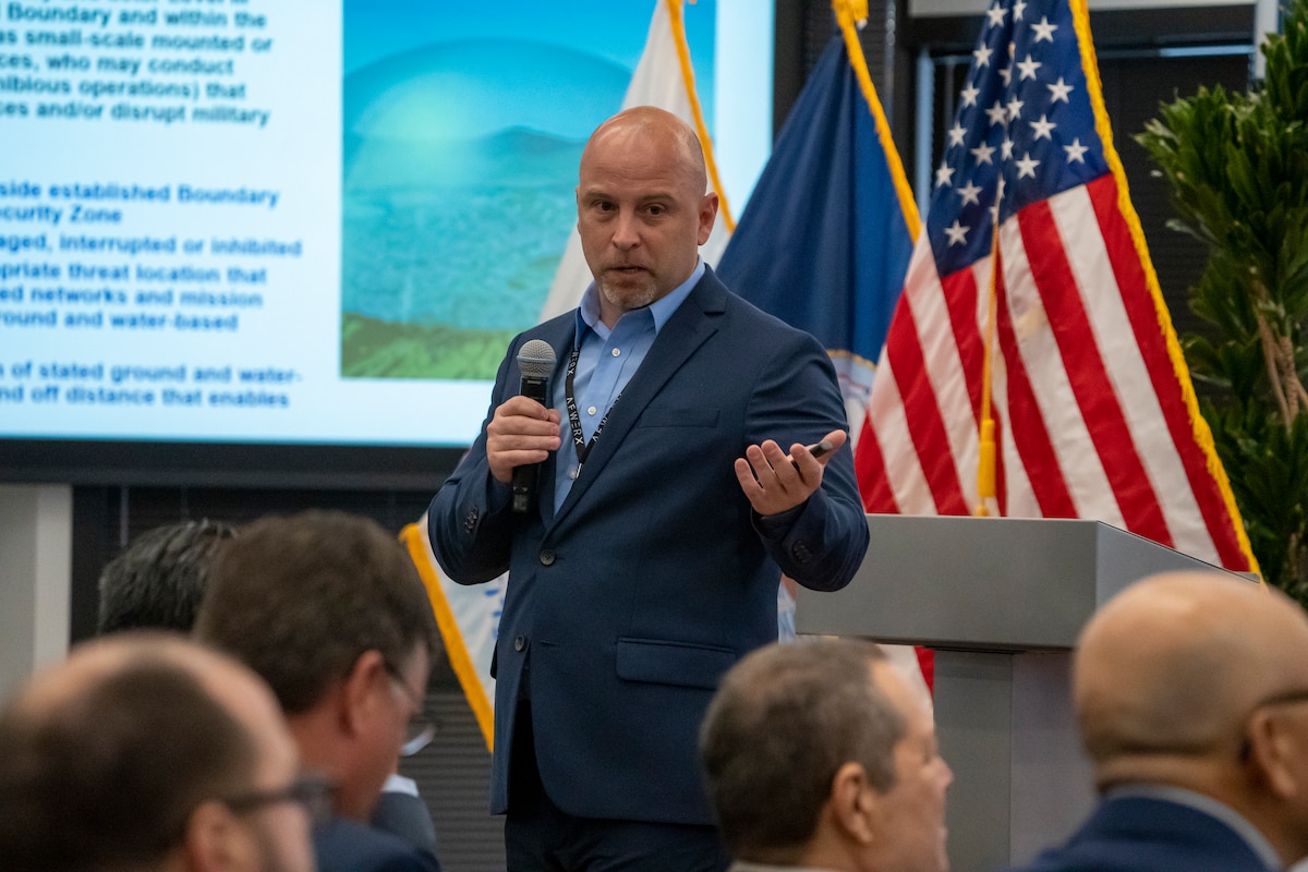 Alexander Erb, Air Force Security Forces Center innovations program manager, briefs more than 20 industry partners at the Fed Supernova Spark Collider event at Capital Factory in Austin, Texas, Aug. 22, 2023.