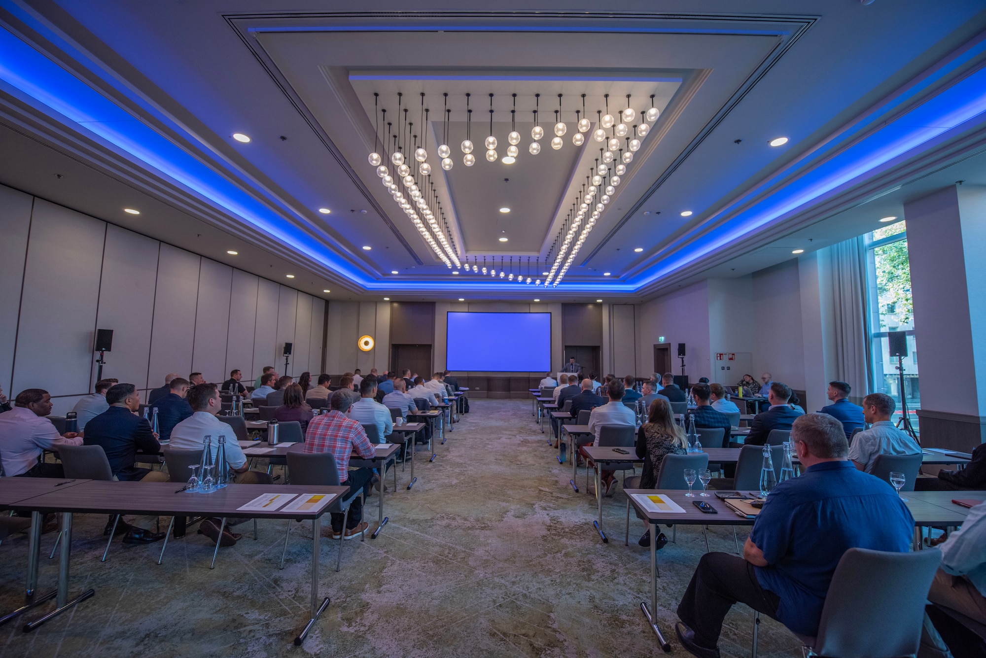 People attend a conference