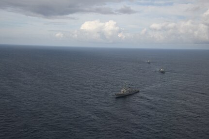 Japanese Maritime Self-Defense Force Maya-class guided missile destroyer Haguro (DDG-180); Arleigh Burke-class guided-missile destroyer USS Benfold (DDG 65); and Republic of Korea Sejong the Great-class destroyer Yulgok Yi (DDG-992) sail in formation during a trilateral exercise on Aug. 29.
