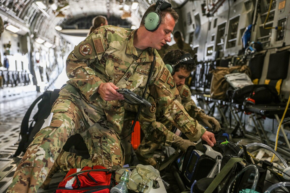 Image of Airmen training on aircraft.