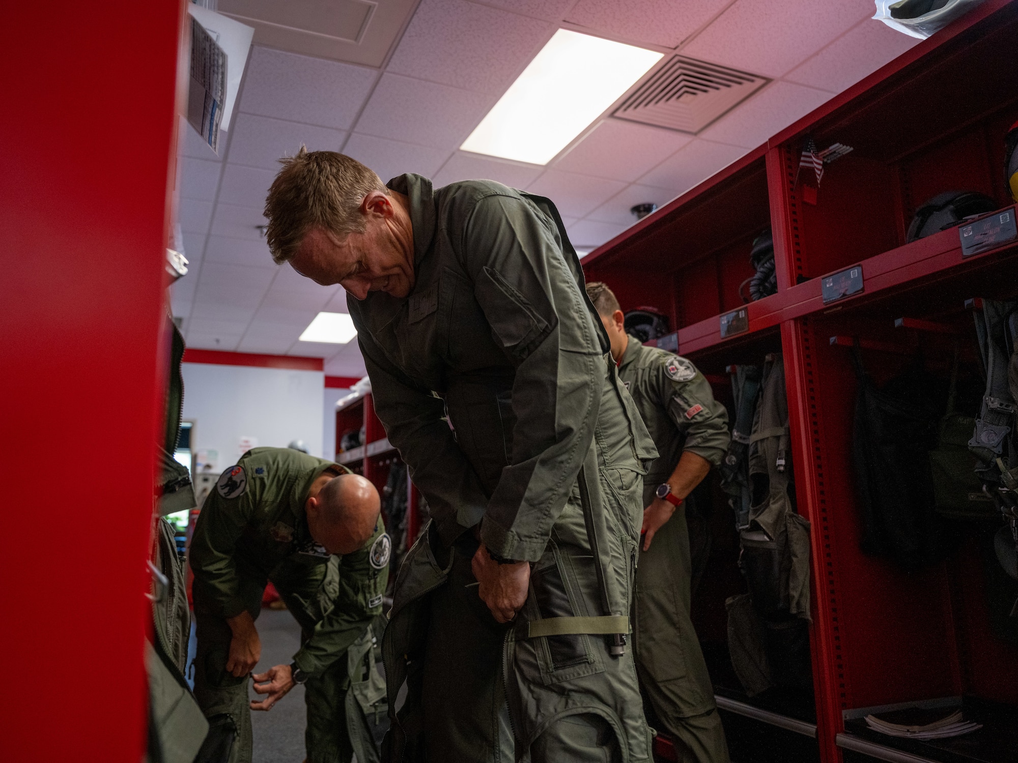 Ted Budd, North Carolina Senator, puts on a G-suit during a visit at Seymour Johnson Air Force Base, North Carolina, Aug. 18, 2023. Budd and his staff help safeguard Department of Defense employee’s interests regarding working conditions, job security and employment status. (U.S. Air Force photo by Senior Airman David Lynn)