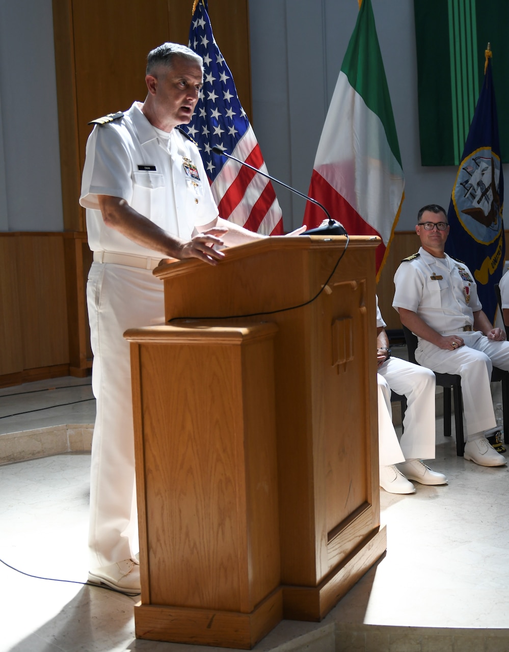 Cmdr. Mike Dwan, incoming commodore of commander, task force (CTF) 64, delivers remarks during a change of command ceremony onboard Naval Support Activity Naples, Italy, Aug. 3, 2023. CTF 64's mission is to execute operational and tactical integrated air and missile defense (IAMD), including mission planning, execution, and operational and tactical control of assigned units for commander, U.S. Naval Forces Europe-Africa and commander, U.S. Sixth Fleet. CTF 64 also provides direct support for Aegis ballistic missile defense planning to commander, U.S. Air Forces Europe and commander, Allied Air Command. (U.S. Navy photo by Mass Communication Specialist Seaman Joseph Macklin)