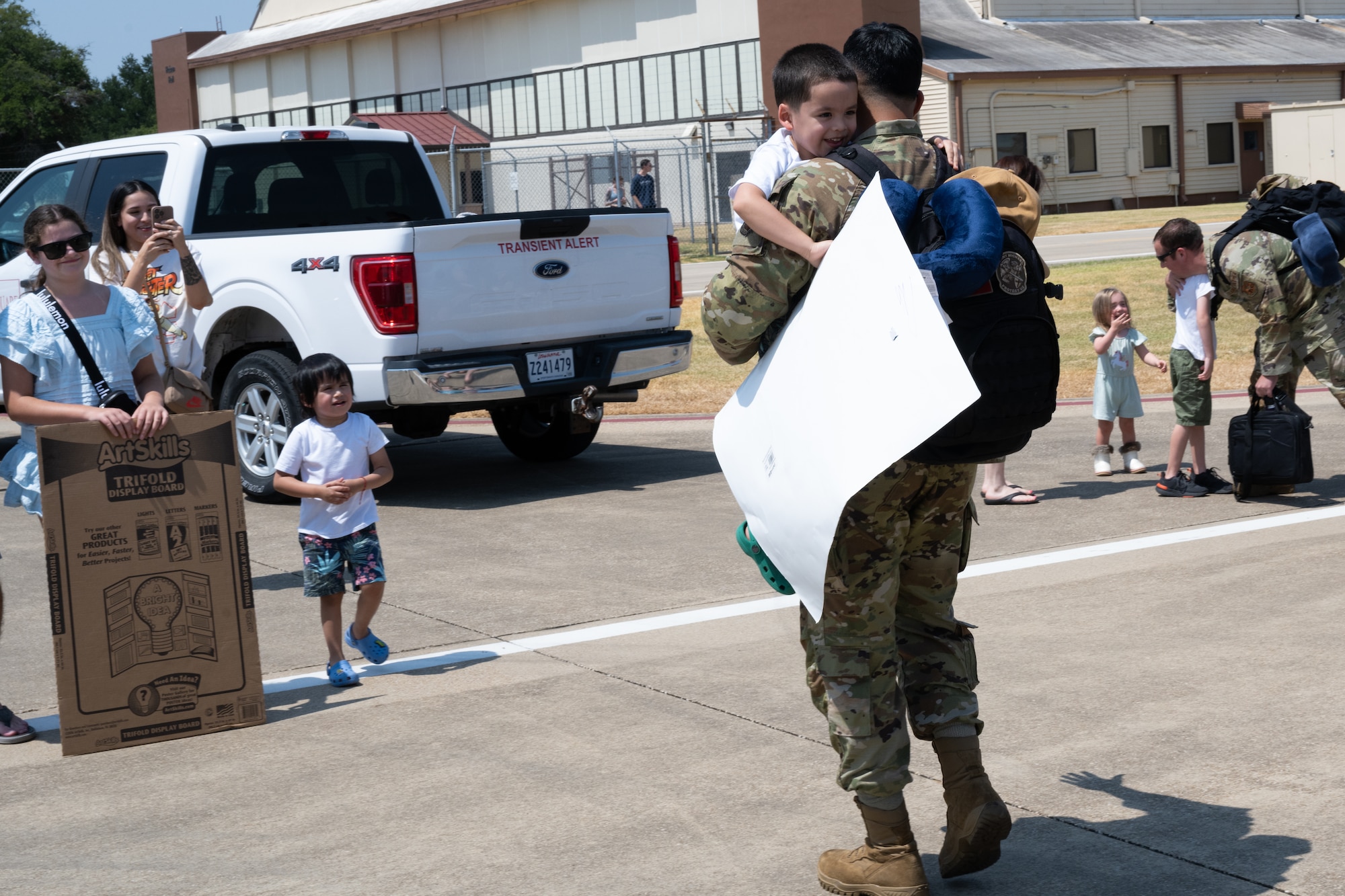 An Airman from the 2nd Bomb Wing reunites with family after deployment to Andersen Air Force Base, Guam at Barksdale Air Force Base, La.
