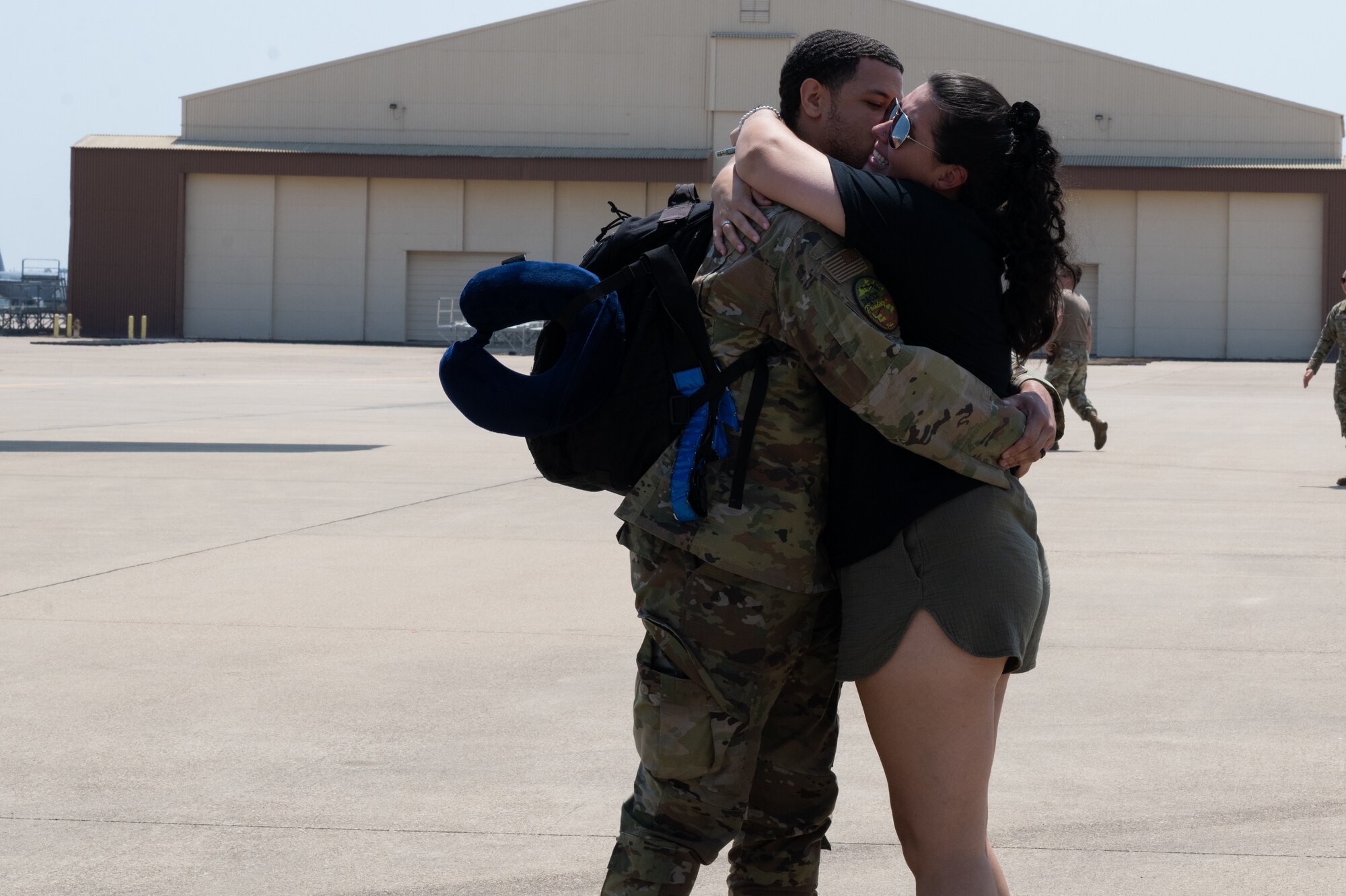 An Airman from the 2nd Bomb Wing reunites with family after deployment to Andersen Air Force Base, Guam at Barksdale Air Force Base, La.