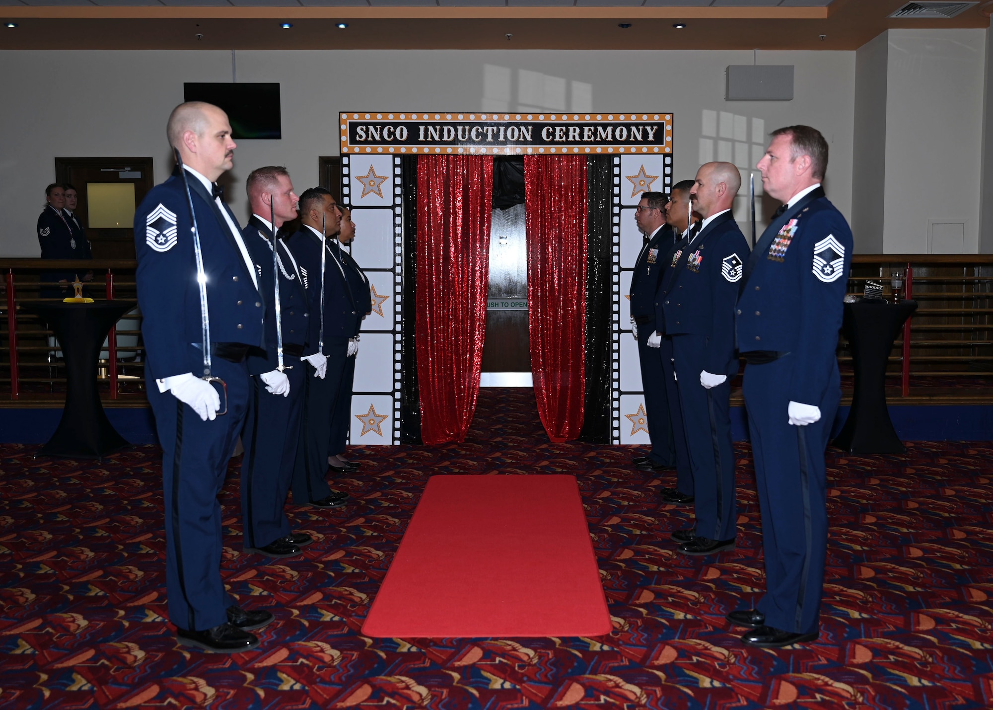 The ceremony celebrates the induction of technical sergeants to master sergeant, the first rank in the SNCO tier.