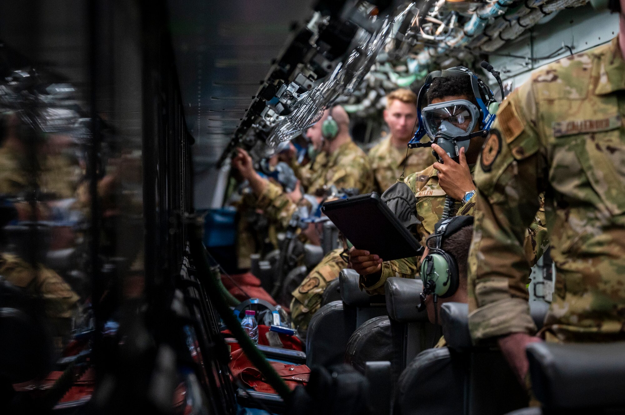 Service members in an aircraft